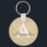 Porte-clés Monogramme de luxe pailleté et scintillant or<br><div class="desc">Chaîne de clés élégante en faux paillettes et or brillant de luxe. Ces porte-clés peuvent être personnalisés pour inclure votre initiale et votre prénom et sont un cadeau idéal pour une fête de mariage,  une soirée entre filles ou un anniversaire.</div>