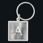 Porte-clés Monogramme en argent de luxe Faux en acier inoxyda<br><div class="desc">Luxe Argent Faux Acier Inoxydable Metallic Elegant Porte - clé. Ces Porte - clés peuvent être customisés pour inclure votre nom initial et prénom. Ces porte - clés fêtent un grand anniversaire,  une douche nuptiale ou une fête de bachelorette.</div>