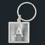 Porte-clés Monogramme en argent de luxe Faux en acier inoxyda<br><div class="desc">Luxe Argent Faux Acier Inoxydable Metallic Elegant Porte - clé. Ces Porte - clés peuvent être customisés pour inclure votre nom initial et prénom. Ces porte - clés fêtent un grand anniversaire,  une douche nuptiale ou une fête de bachelorette.</div>
