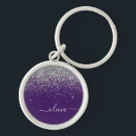 Porte-clés Monogramme fille scintillant argent violet<br><div class="desc">Monogramme d'écriture à paillettes argent et violet pour porte-clés (Porte-clé). C'est le cadeau idéal pour un anniversaire sweet 16,  un mariage,  une douche de mariée,  un anniversaire,  une baby shower ou une soirée d'enterrement de vie de jeune fille pour quelqu'un qui aime le luxe glamour et les styles chics.</div>