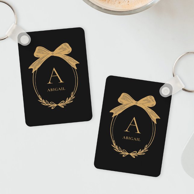 Porte-clés Monogramme Moderne Initiale Noir et Or Chic Nœud (Modern Initial Black and Gold Chic Bow Monogram Keychain)