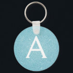 Porte-clés Monogramme Parties scintillant bleue et étincelle<br><div class="desc">Parties scintillant turquoise Blue Faux et Porte - clé élégant étincelant. Ces Porte - clés peuvent être customisés pour inclure votre nom initial et prénom et sont une douche de mariée parfaite,  une fête de bachelorette ou une fête d'anniversaire.</div>