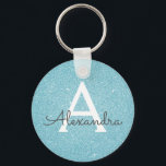 Porte-clés Monogramme Parties scintillant bleue et étincelle<br><div class="desc">Parties scintillant turquoise Blue Faux et Porte - clé élégant étincelant. Ces Porte - clés peuvent être customisés pour inclure votre nom initial et prénom et sont une douche de mariée parfaite,  une fête de bachelorette ou une fête d'anniversaire.</div>
