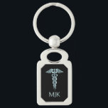 Porte-clés Monogramme Turquoise Caduceus<br><div class="desc">Turquoise Porte - clé Caduceus prêt pour vous à personnaliser. Un grand cadeau pour toute personne dans le domaine médical. ⭐ Ce Produit est 100% Personnalisable. Les graphiques et / ou le texte peuvent être ajoutés, supprimés, déplacés, redimensionnés, changés autour, tournés, etc... 99% de mes designs dans mon magasin sont...</div>