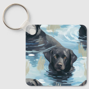Porte-clés Motif de natation du Labrador noir