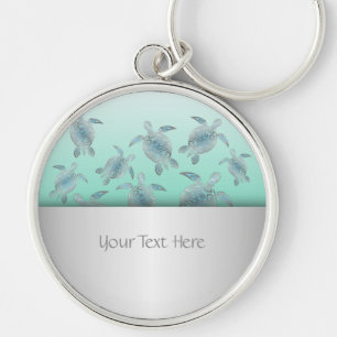 Porte-clés Motif des tortues de mer turquoise argentée