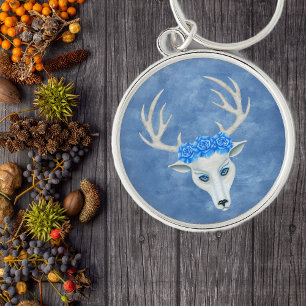 Porte-clés Mystérieuse tête de cerf blanc Antlers Roses bleus