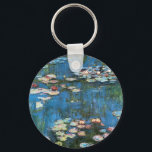 Porte-clés Nénuphars de Claude Monet, Impressionnisme Vintage<br><div class="desc">Nénuphar (1914) de Claude Monet est une peinture de nature impressionniste vintage. Une des nombreuses variations de peintures florales de nénuphars que Monet peint par l'étang dans son jardin fleuri à Giverny, France. À propos de l'artiste : Claude Monet (1840-1926) est un fondateur du mouvement de peinture impressionniste française, dont...</div>