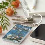 Porte-clés Nénuphars de Claude Monet, Impressionnisme Vintage<br><div class="desc">Nénuphar (1914) de Claude Monet est une peinture de nature impressionniste vintage. Une des nombreuses variations de peintures florales de nénuphars que Monet peint par l'étang dans son jardin fleuri à Giverny, France. À propos de l'artiste : Claude Monet (1840-1926) est un fondateur du mouvement de peinture impressionniste française, dont...</div>