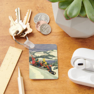 Porte-clés Noël vintage, enfants faisant de la luge sur une m