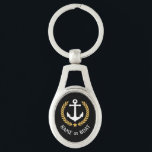Porte-clés Nom du bateau Ancre Gold Style Laurel et Star Blac<br><div class="desc">Un porte - clé métallique personnalisé avec votre nom de bateau, nom de famille ou autre texte souhaité, selon les besoins. Doté d'une ancre nautique conçue sur mesure, de feuilles de laurier de style or et d'emblème d'étoile sur le noir ou de régler facilement la couleur primaire pour correspondre à...</div>