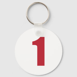 Porte-clés Numéro 1 en rouge sur le porte - clé blanc de