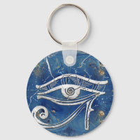 OEil égyptien en argent sur marbre bleu