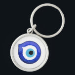 Porte-clés Oeil malin<br><div class="desc">Ce porte - clé captivant présente une conception complexe de l'oeil du Mal,  symbolisant la protection contre l'énergie négative et apportant de la chance.</div>
