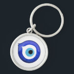 Porte-clés Oeil malin<br><div class="desc">Ce porte - clé captivant présente une conception complexe de l'oeil du Mal,  symbolisant la protection contre l'énergie négative et apportant de la chance.</div>