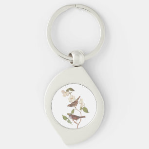 Porte-clés Oiseau Audubon à bec blanc dans le Dogwood