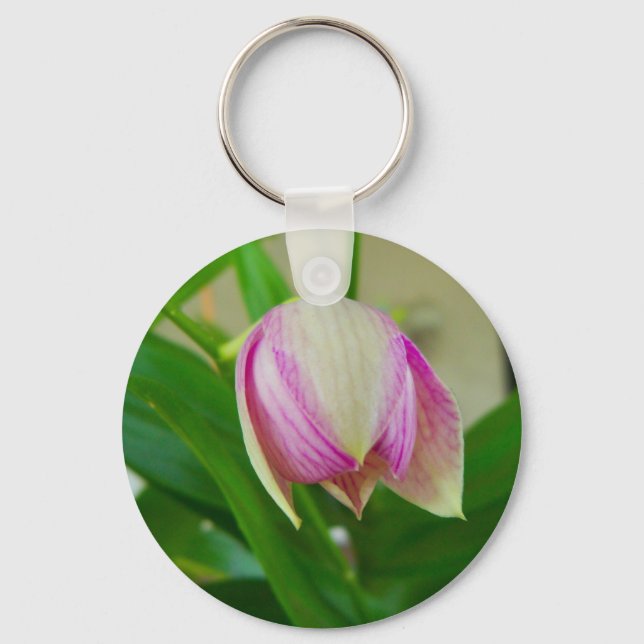 Porte-clés Orchidée blanche et violette sur un porte - clé (Recto)