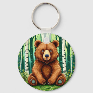 Porte-clés Ours grizzly dans une forêt de bouleaux