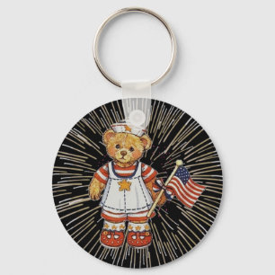 Porte-clés Ours infirmière vintage avec feux d'artifice blanc