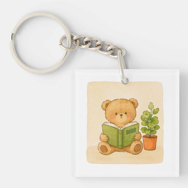 Porte-clés ourson en peluche lisant un livre (Devant)