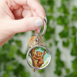 Porte-clés Ourson mignon grimpant à un arbre