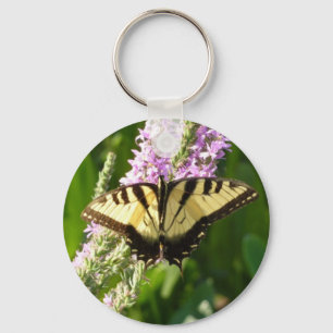 Porte-clés Papillon à queue d'aronde sur des fleurs sauvages