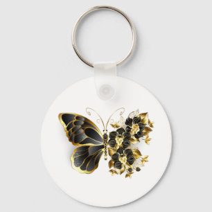 Porte-clés Papillon fleur d'or avec orchidée noire