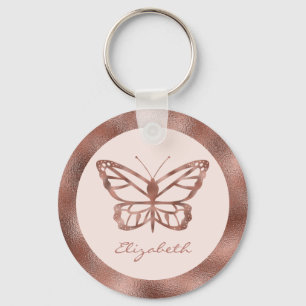 Porte-clés Papillon imitation or rose gold sur fond rose blus