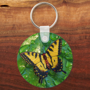 Porte-clés Papillon jaune 3D sur Raindrops feuille verte