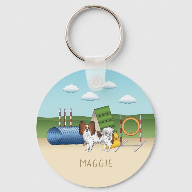 Porte-clés Papillon Rouge Sable avec Équipement d'Agilité (Recto)