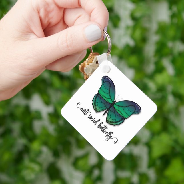 Porte-clés Papillon vert anti-social (main)