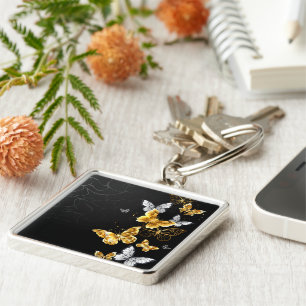 Porte-clés Papillons blancs et dorés