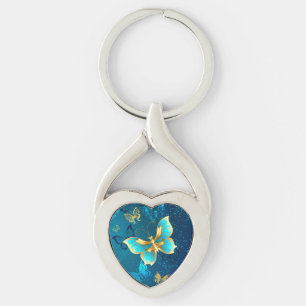Porte-clés Papillons dorés sur fond bleu
