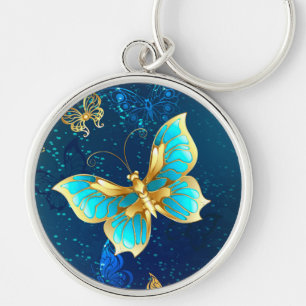 Porte-clés Papillons dorés sur fond bleu