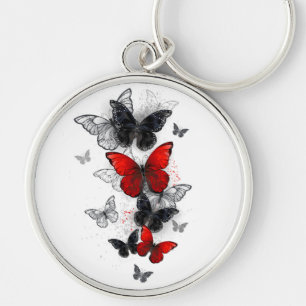 Porte-clés Papillons noirs et rouges volants