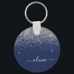 Porte-clés Parties scintillant bleue Silver Navy Girl Monogra<br><div class="desc">Parties scintillant à étincelles bleu marine et argent Script Monogramme Nom Clés (Porte - clé). Cela rend le cadeau parfait pour 16 ans,  mariage,  douche nuptiale,  anniversaire,  baby shower ou bachelorette pour quelqu'un qui aime le luxe glam et les styles chic.</div>