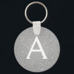 Porte-clés Parties scintillant en argent de luxe et monogramm<br><div class="desc">Parties scintillant de luxe Silver Faux et Porte - clé élégant étincelant. Ces Porte - clés peuvent être customisés pour inclure votre nom initial et prénom et sont une douche de mariée parfaite,  une fête de bachelorette ou une fête d'anniversaire.</div>