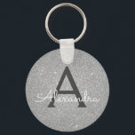 Porte-clés Parties scintillant en argent de luxe et monogramm<br><div class="desc">Parties scintillant de luxe Silver Faux et Porte - clé élégant étincelant. Ces Porte - clés peuvent être customisés pour inclure votre nom initial et prénom et sont une douche de mariée parfaite,  une fête de bachelorette ou une fête d'anniversaire.</div>