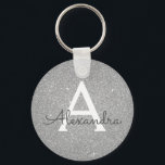Porte-clés Parties scintillant en argent de luxe et monogramm<br><div class="desc">Parties scintillant de luxe Silver Faux et Porte - clé élégant étincelant. Ces Porte - clés peuvent être customisés pour inclure votre nom initial et prénom et sont une douche de mariée parfaite,  une fête de bachelorette ou une fête d'anniversaire.</div>