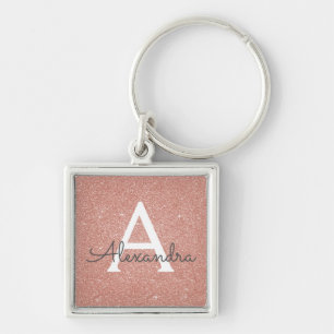 Porte-clés Parties scintillant en or rose et monogramme étinc