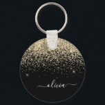 Porte-clés Parties scintillant Noir Or Script Monogramme Nom<br><div class="desc">Parties scintillant à étincelle noire et or Script Monogramme Nom Clés (Porte - clé). Cela rend le cadeau parfait pour 16 ans,  mariage,  douche nuptiale,  anniversaire,  baby shower ou bachelorette pour quelqu'un qui aime le luxe glam et les styles chic.</div>