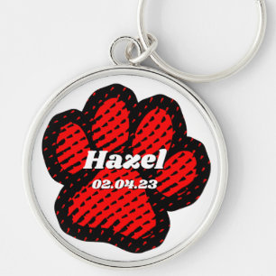 Porte-clés Patte rouge de chien