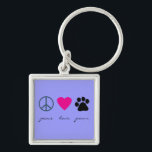 Porte-clés Pattes d'amour de paix<br><div class="desc">Signe, coeur et empreinte de patte de paix Cette conception de produit élégante de pattes d'amour de paix avec un signe de paix, un coeur et un empreinte de patte fait un cadeau unique pour des propriétaires et des amoureux des animaux d'animal familier, particulièrement chien et des propriétaires et des...</div>