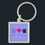 Porte-clés Pattes d'amour de paix<br><div class="desc">Signe, coeur et empreinte de patte de paix Cette conception de produit élégante de pattes d'amour de paix avec un signe de paix, un coeur et un empreinte de patte fait un cadeau unique pour des propriétaires et des amoureux des animaux d'animal familier, particulièrement chien et des propriétaires et des...</div>