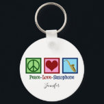 Porte-clés Peace Love Saxophone mignon Monogram Blue<br><div class="desc">Un joli cadeau de joueur de sax bleu avec un signe de paix,  le coeur et l'instrument de saxophone. Cool Peace Love Saxophones porte - clé.</div>