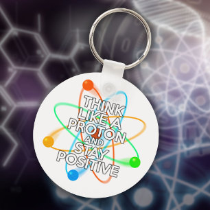 PORTE-CLÉS PENSEZ COMME UN PROTON ET RESTEZ POSITIF
