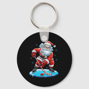 Porte-clés Père Noël de Noël drôle jouant au hockey sur glace