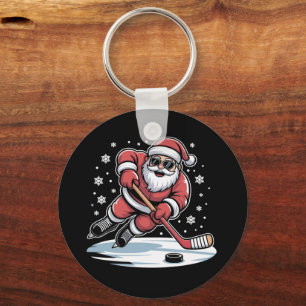 Porte-clés Père Noël de Noël drôle jouant au hockey sur glace
