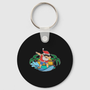 Porte-clés Père Noël drôle qui fait du dab en surfant Noël d'