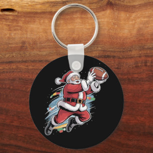 Porte-clés Père Noël jouant au football américain de Noël